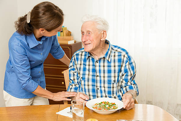 Caregiver with senior man